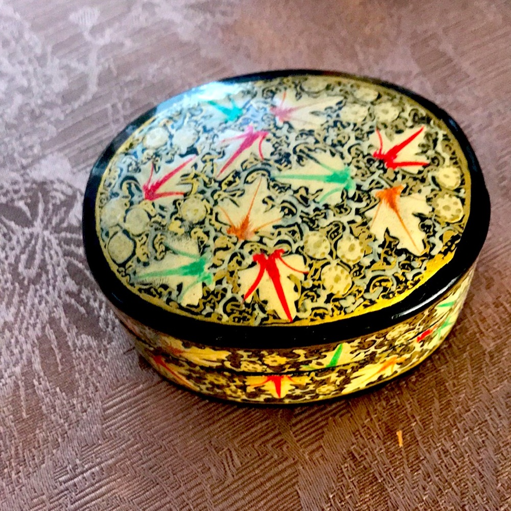 Handcrafted and painted oval box made in Kashmir.